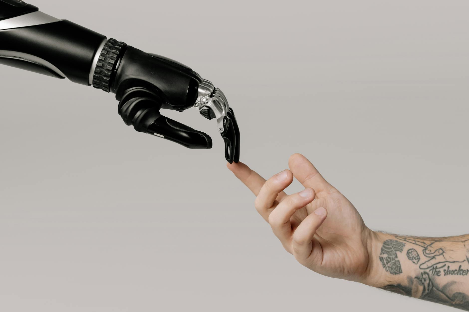 a human hand and a robot hand