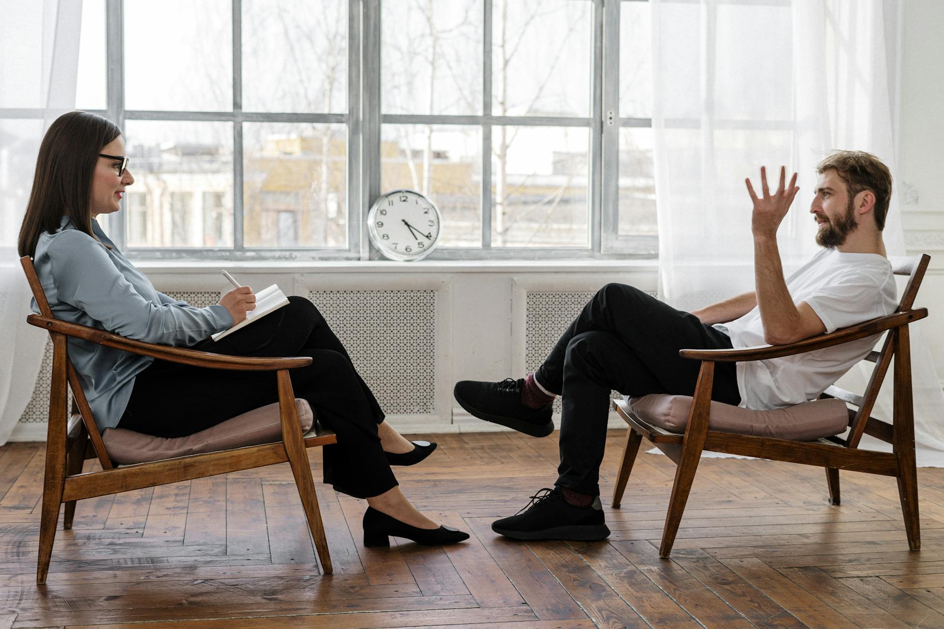 two people sitting opposite each other